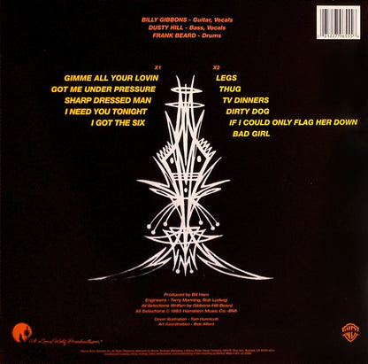 Album back cover with track list text and centered white starburst emblem